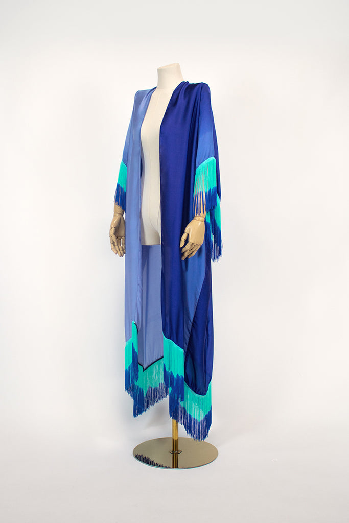 Tropical print dresses
Bold prints
Statement clothing
Women's dresses
Bohemian fashion
Vintage-inspired
Retro style
Festival outfits
Australian fashion
Sustainable clothing
Unique patterns