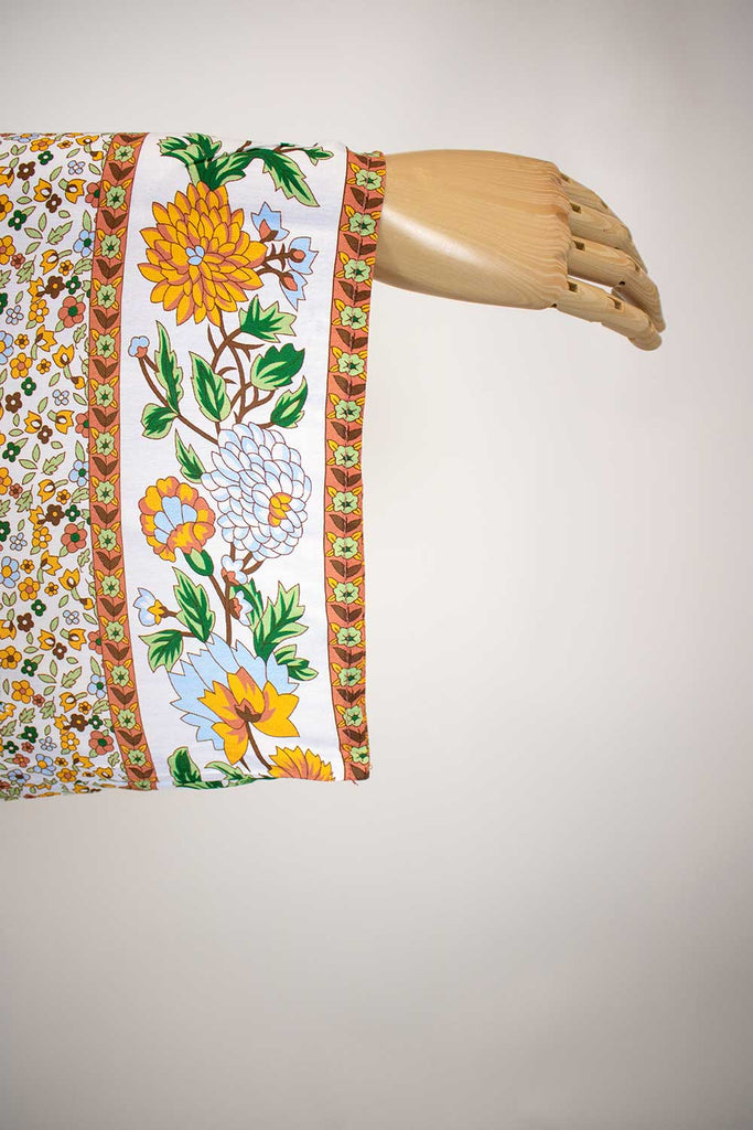 Designer tops
Fashion accessories
Swim cover-ups
Summer resort collections
Women's lifestyle clothing
Travel-inspired fashion
Boho chic
Vintage-inspired
Floral prints
Designer collections
Luxury resort wear