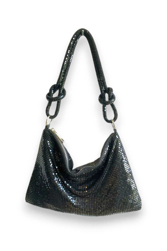 Glomesh purse
70s vintage-inspired
Shimmer purse
Evening bag
Knotted strap detail
Glamorous purse
After Dark purse collection
Shiny evening clutch
Sleek black purse
Gilded gold purse