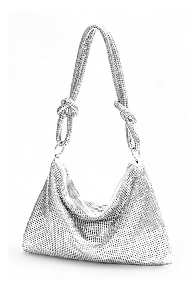 Glomesh purse
70s vintage-inspired
Shimmer purse
Evening bag
Knotted strap detail
Glamorous purse
After Dark purse collection
Shiny evening clutch
Sleek black purse
Gilded gold purse