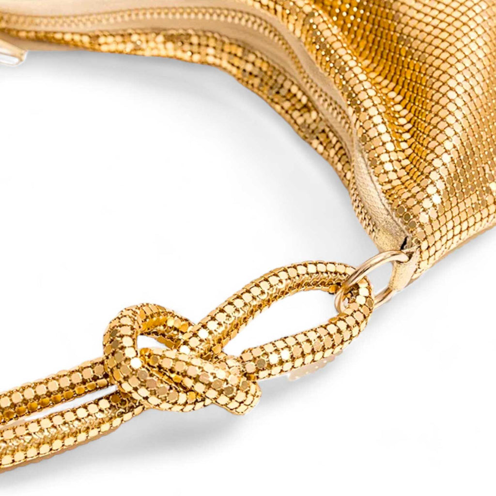 Glomesh purse
70s vintage-inspired
Shimmer purse
Evening bag
Knotted strap detail
Glamorous purse
After Dark purse collection
Shiny evening clutch
Sleek black purse
Gilded gold purse