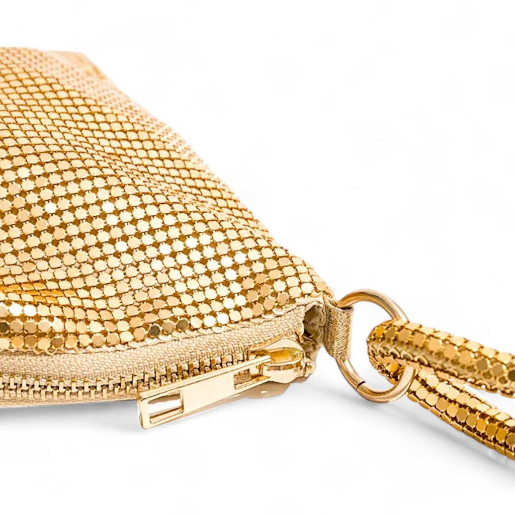 Glomesh purse
70s vintage-inspired
Shimmer purse
Evening bag
Knotted strap detail
Glamorous purse
After Dark purse collection
Shiny evening clutch
Sleek black purse
Gilded gold purse