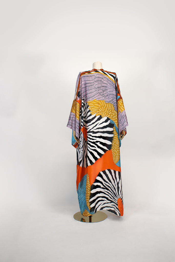 Fashion accessories
Swim cover-ups
Summer resort collections
Women's lifestyle clothing
Travel-inspired fashion
Boho chic
Vintage-inspired
Floral prints
Designer collections
Luxury resort wear
Summer fashion